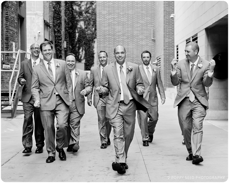 Minneapolis Wedding Portrait of Groom and his groomsment walking